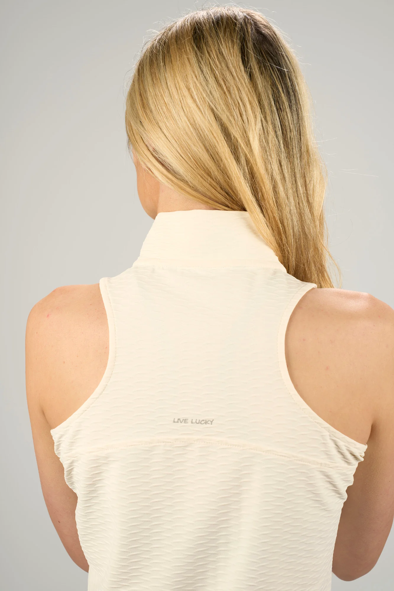 Astra Zip Sleeveless